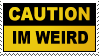 Stamp that reads 'CAUTION - IM WEIRD